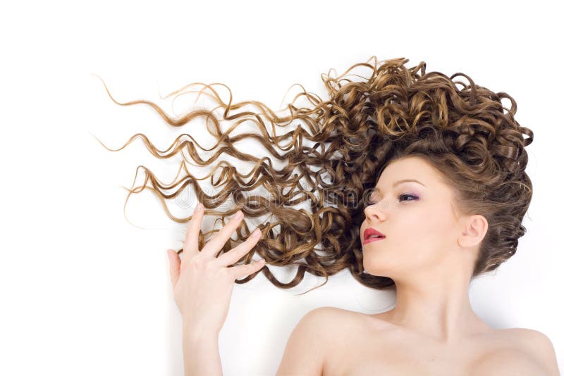 Portrait of the beautiful woman with long curly hair. Portrait of the beautiful woman with long curly hair