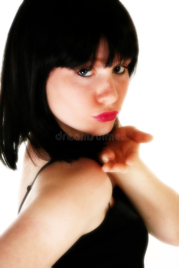 Beautiful 14 year old teen with black hair blowing kiss. Beautiful 14 year old teen with black hair blowing kiss.