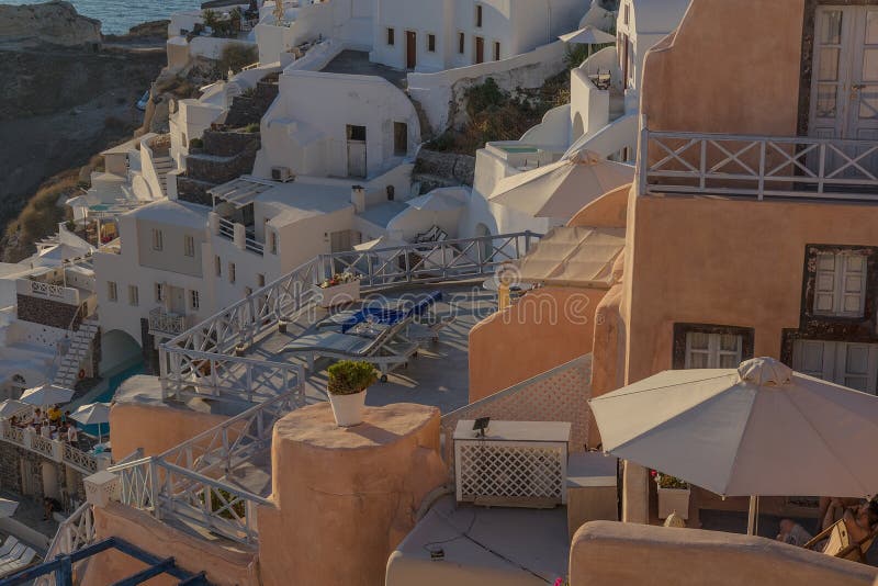Красивое место захода солнца самое большее известное Oia, Santorini Gre стоковое фото rf Красивое место захода солнца самое большее известное Oia, Santorini Gre стоковое фото rf