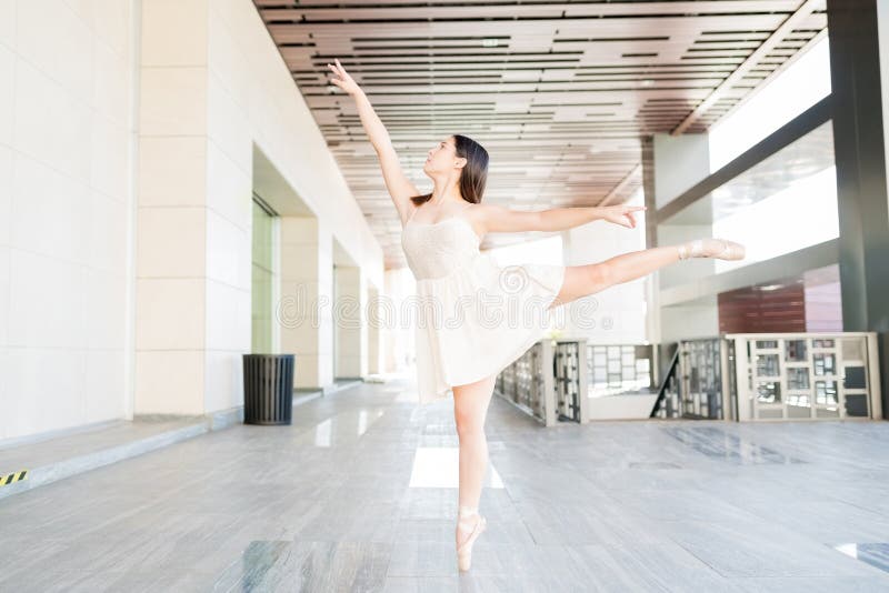 Talented ballet dancer showing her skills while performing in dance routine. Talented ballet dancer showing her skills while performing in dance routine