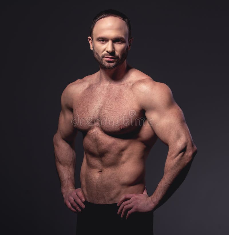 Красивый muscled человек стоковые изображения Красивый muscled человек стоковые изображения