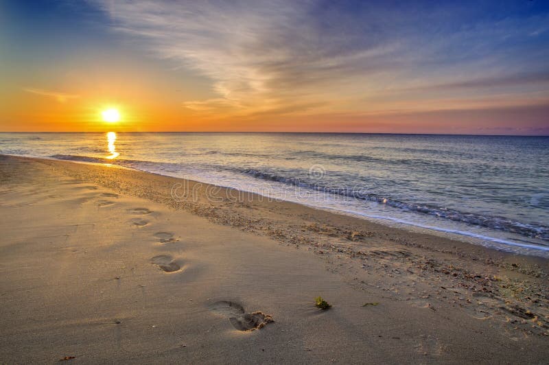 Beautiful seascape, footprints in the sand. Beautiful seascape, footprints in the sand.