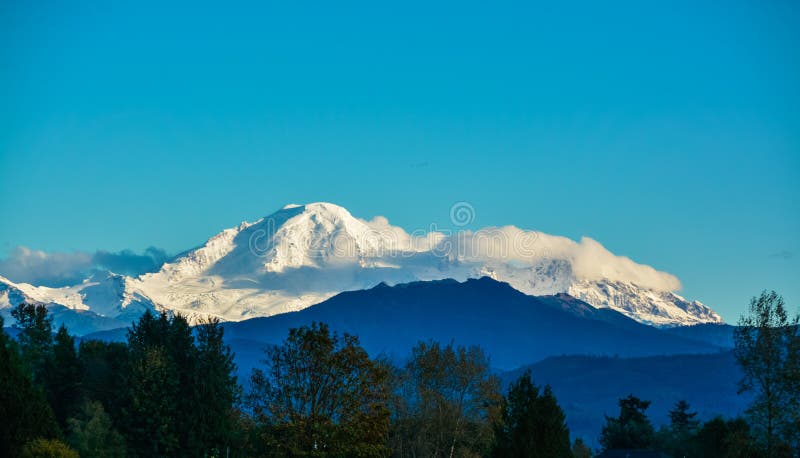 Beautiful view of mountain Baker from the Fraser Valley in evening time. Beautiful view of mountain Baker from the Fraser Valley in evening time