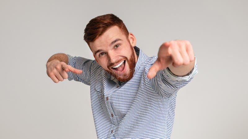 You are special! Cool caucasian man suggest challenge at camera, choosing to compete, beige studio background. You are special! Cool caucasian man suggest challenge at camera, choosing to compete, beige studio background