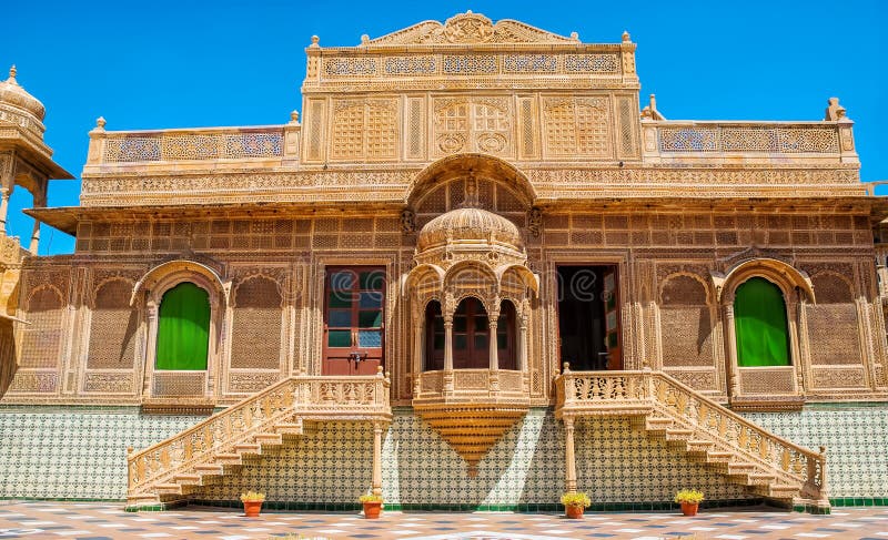 Красивый экстерьер дворца Mandir в Jaisalmer, Раджастхане, Индии Jaisalmer очень популярное туристское назначение в Rajasth стоковая фотография Красивый экстерьер дворца Mandir в Jaisalmer, Раджастхане, Индии Jaisalmer очень популярное туристское назначение в Rajasth стоковая фотография