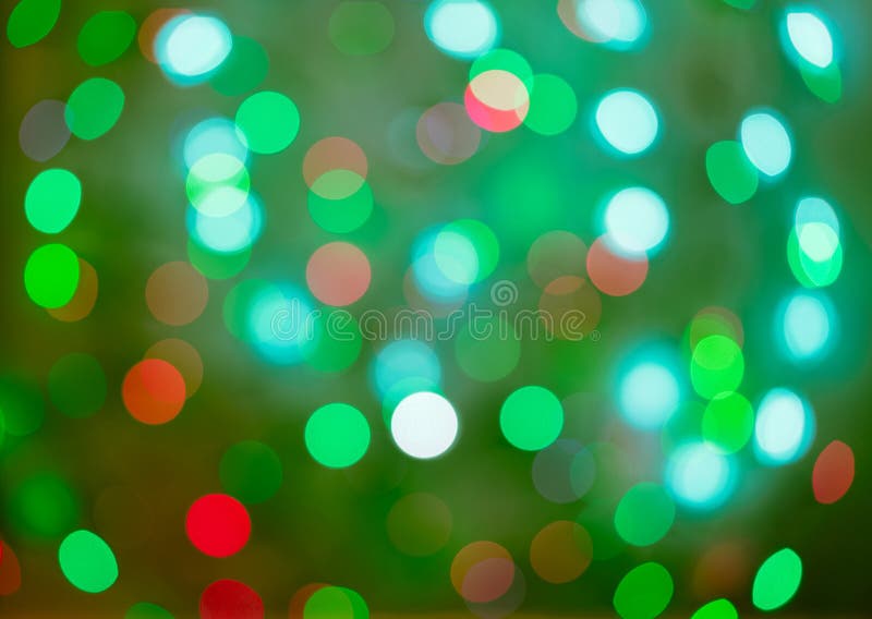 Красное и зеленое bokeh праздника абстрактное рождество предпосылки стоковые фотографии rf