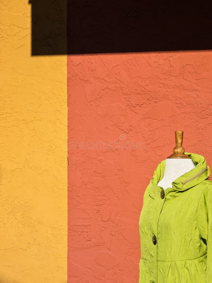 Colorful wall and jacket outside a boutique. Colorful wall and jacket outside a boutique