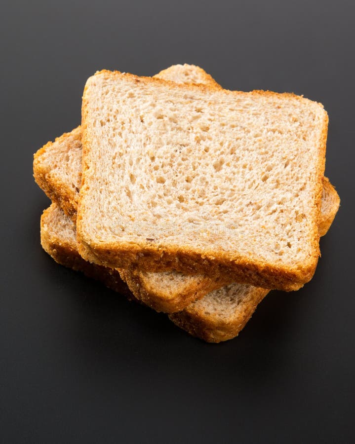 Куча провозглашанных тост кусков хлеба стоковые фото Куча провозглашанных тост кусков хлеба стоковые фото