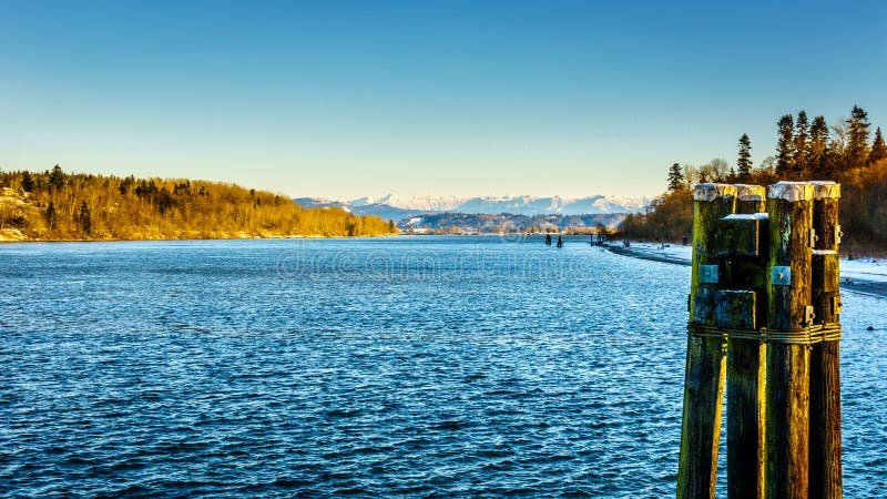 Winter landscape along the Fraser River near the historic town of Fort Langley in British Columbia, Canada. Winter landscape along the Fraser River near the historic town of Fort Langley in British Columbia, Canada