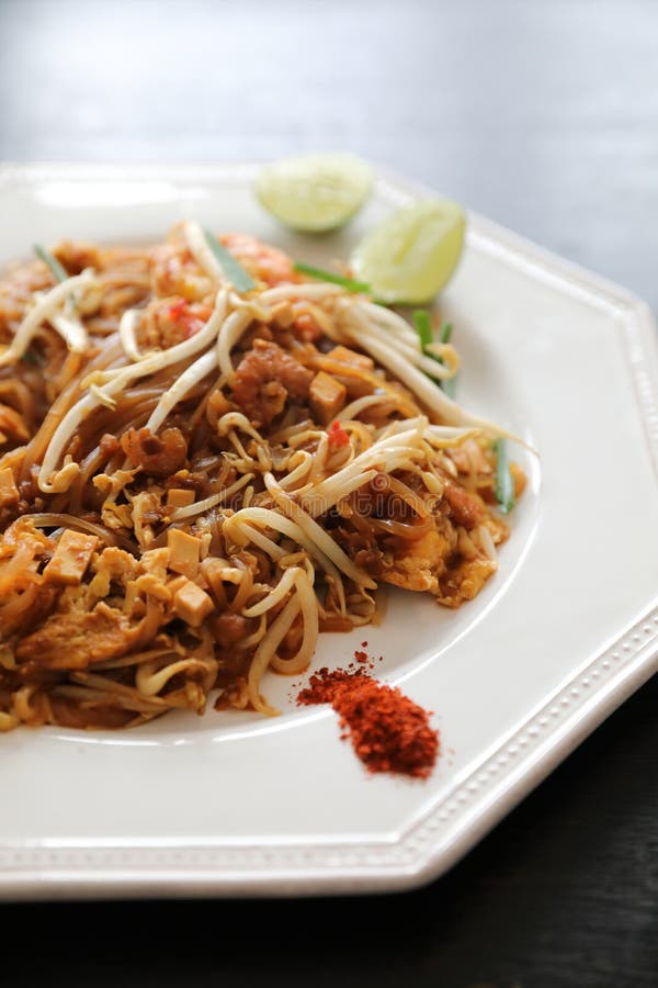 Thai food pad thai fried noodle with shrimp on a plate. Thai food pad thai fried noodle with shrimp on a plate