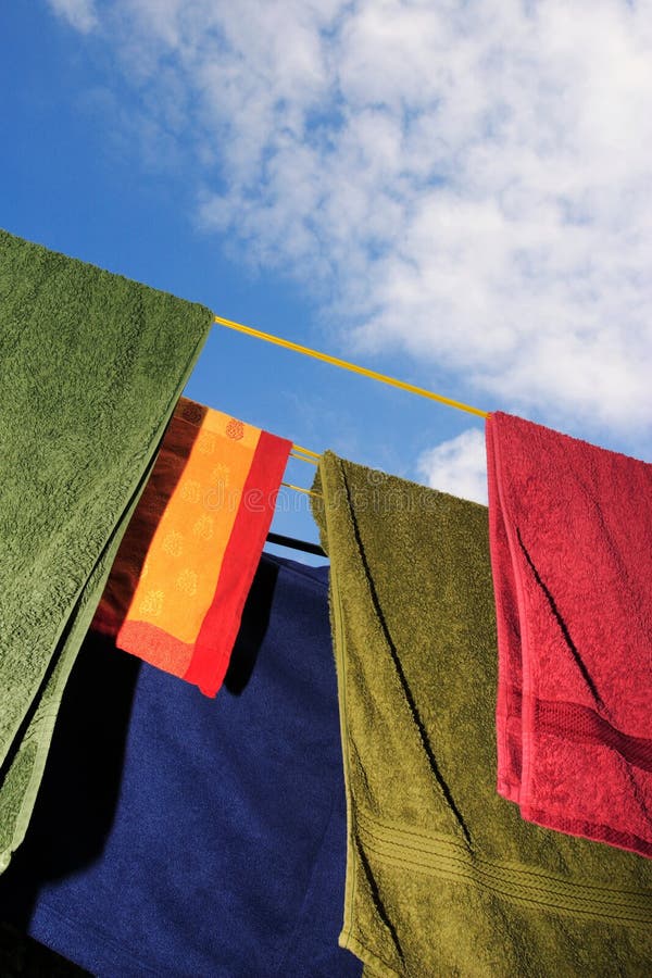 Brightly colored washing on a clothes line. Brightly colored washing on a clothes line