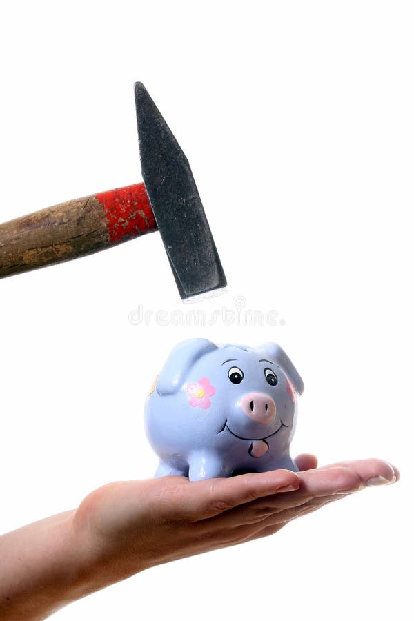 A young woman is breaking her piggybank with a hammer. Isolated over white with a lot of space for text!. A young woman is breaking her piggybank with a hammer. Isolated over white with a lot of space for text!