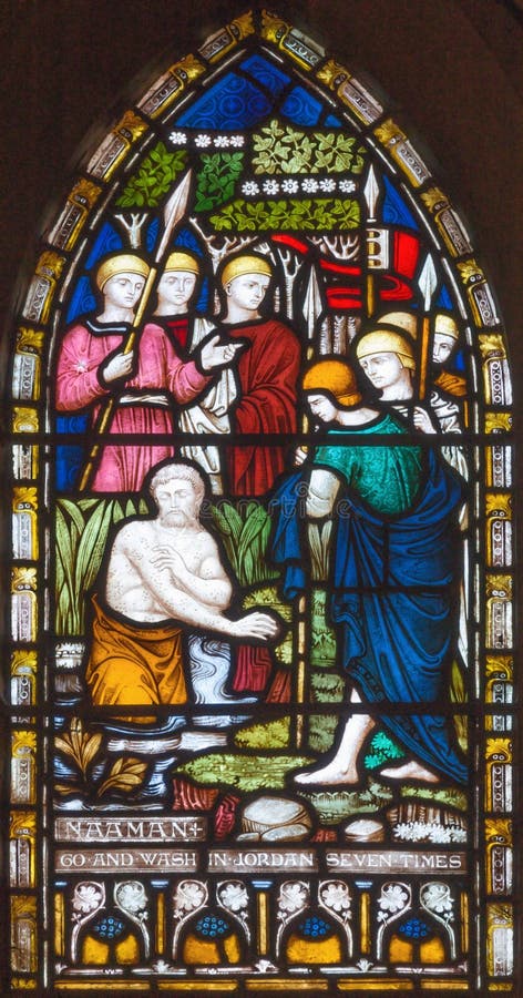 LONDON, GREAT BRITAIN - SEPTEMBER 19, 2017: The Naaman of Syria bathing in Jordan on the stained glass in St Mary Abbot`s church on Kensington High Street. LONDON, GREAT BRITAIN - SEPTEMBER 19, 2017: The Naaman of Syria bathing in Jordan on the stained glass in St Mary Abbot`s church on Kensington High Street.