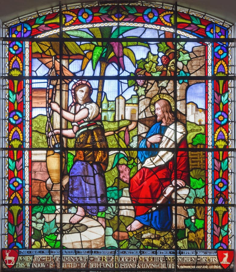 LONDON, GREAT BRITAIN - SEPTEMBER 15, 2017: The Jesus and Samaritans at well scene on the satined glass of St James`s Church, Clerkenwell. LONDON, GREAT BRITAIN - SEPTEMBER 15, 2017: The Jesus and Samaritans at well scene on the satined glass of St James`s Church, Clerkenwell.