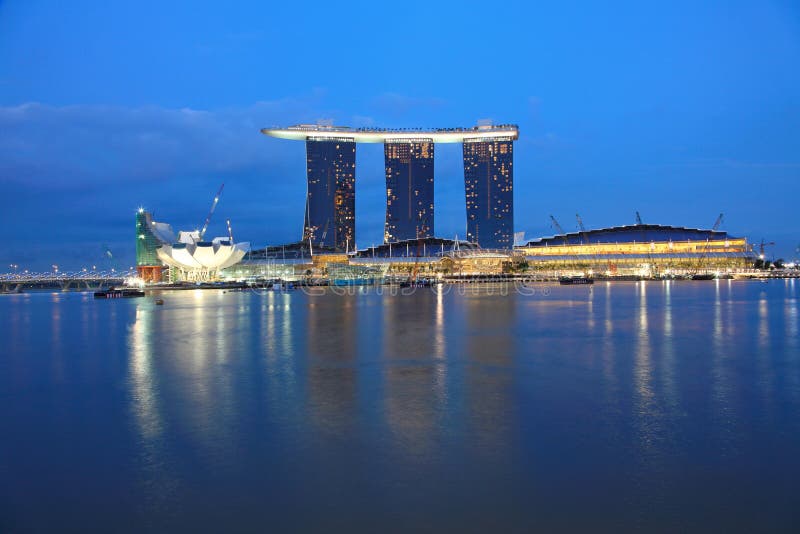 Marina Bay Sands Integrated Resort /Casino with shopping mall at night,Singapore, view from merlion park. Marina Bay Sands Integrated Resort /Casino with shopping mall at night,Singapore, view from merlion park.