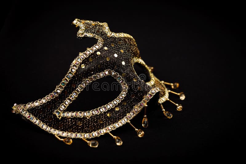 Маска Sequin изолированная на черноте стоковое фото