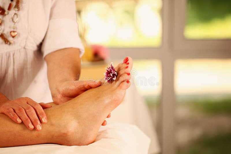 Foot massage in the Spa relaxation. Foot massage in the Spa relaxation