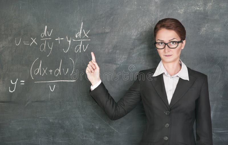 Woman teacher in glasses teaching maths and showing finger. Woman teacher in glasses teaching maths and showing finger