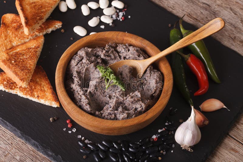 Мексиканская кухня: Refritos Frijoles с концом-вверх ингридиентов Ho стоковая фотография rf Мексиканская кухня: Refritos Frijoles с концом-вверх ингридиентов Ho стоковая фотография rf