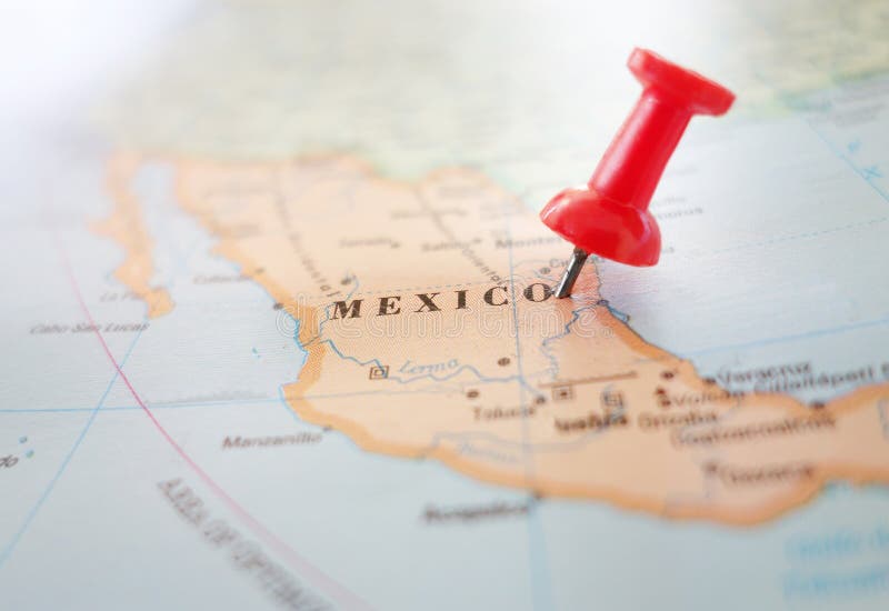 Closeup of a map of Mexico with red thumbtack. Closeup of a map of Mexico with red thumbtack