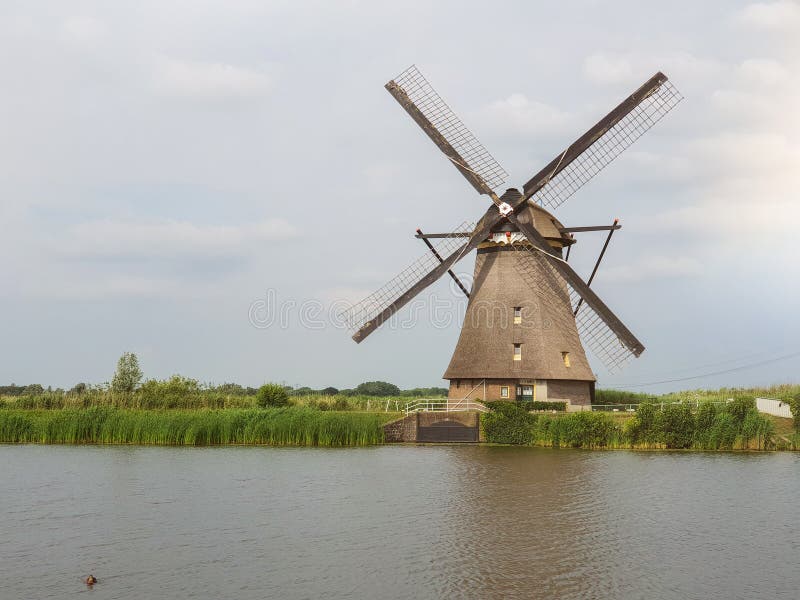 Windmills are part of Dutch history. There are over 1,000 such mills in the country. Windmills are part of Dutch history. There are over 1,000 such mills in the country.