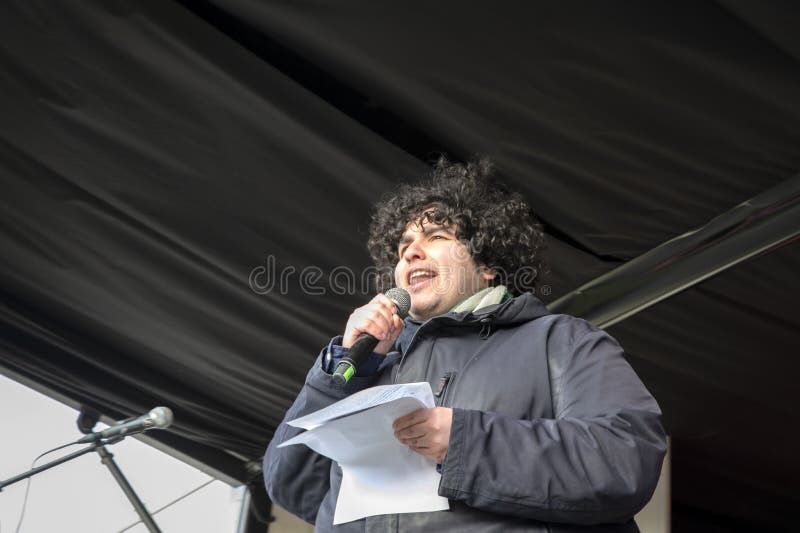 Mert Kumru Speaking To The Crowd At The Niet Mijn Schuld Demonstration At Amsterdam The Netherlands 5-2-2022. Mert Kumru Speaking To The Crowd At The Niet Mijn Schuld Demonstration At Amsterdam The Netherlands 5-2-2022.