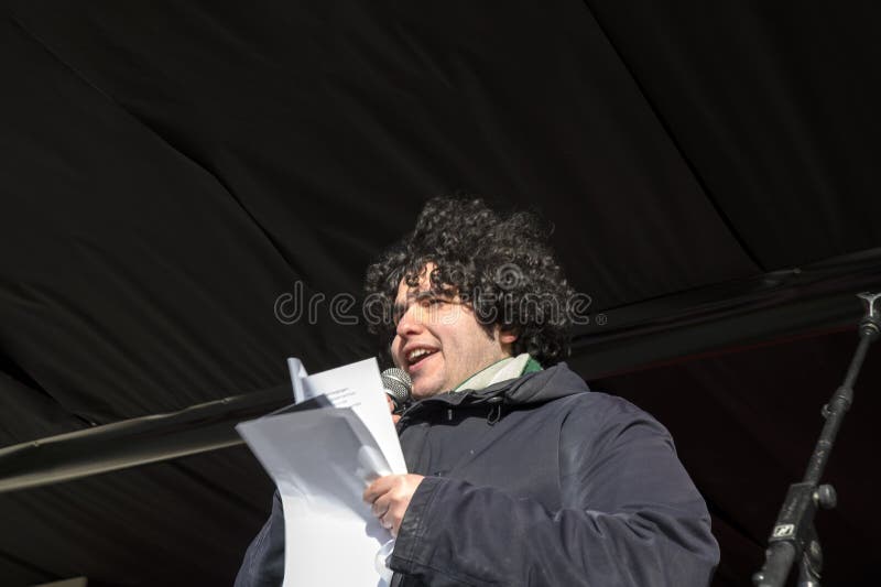 Mert Kumru Speaking To The Crowd At The Niet Mijn Schuld Demonstration At Amsterdam The Netherlands 5-2-2022. Mert Kumru Speaking To The Crowd At The Niet Mijn Schuld Demonstration At Amsterdam The Netherlands 5-2-2022.