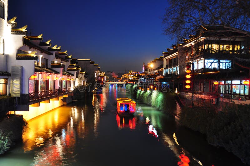 The Qinhuai River is the cradle of the culture of Nanjing. The Qinhuai River View Area has been the most flourishing place of Nanjing for more than 1,000 years, which is called â€œten-kilometer-pearl-decorated curtainsâ€. The most charming view on Qinhuai River is the boat whose name is â€œgaily-painted pleasure-boatsâ€. They imitate the architectural style of Ming Dynasty. The owners like to hang some colorful balls and lanterns on the boats. At night, the light is reflected into the water and adds much vitality to Qinhuai River. The Qinhuai River is the cradle of the culture of Nanjing. The Qinhuai River View Area has been the most flourishing place of Nanjing for more than 1,000 years, which is called â€œten-kilometer-pearl-decorated curtainsâ€. The most charming view on Qinhuai River is the boat whose name is â€œgaily-painted pleasure-boatsâ€. They imitate the architectural style of Ming Dynasty. The owners like to hang some colorful balls and lanterns on the boats. At night, the light is reflected into the water and adds much vitality to Qinhuai River.