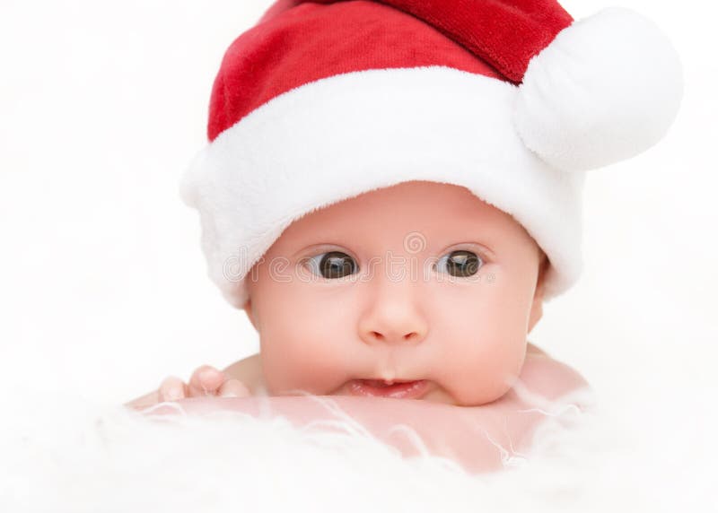 Милый newborn младенец в шляпе рождества стоковая фотография rf