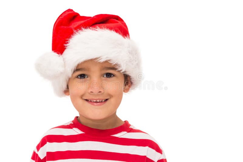 Милый мальчик в шляпе santa стоковые фотографии rf