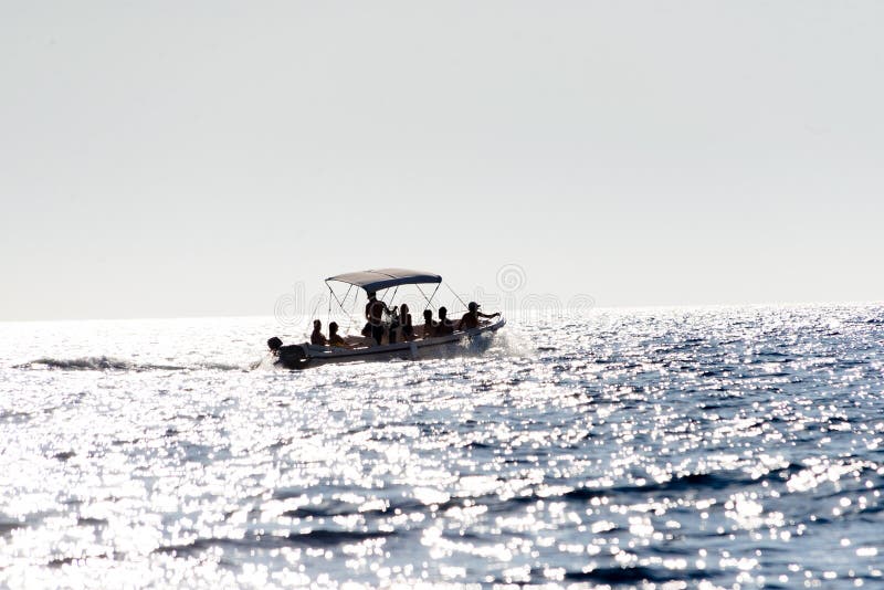 People tourist migrants on motor boat ship on sea far. People tourist migrants on motor boat ship on sea far