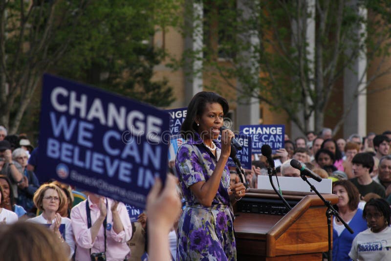 ASHEVILLE, NC - May. 2: Michelle Obama, the wife of presidential candidate Barack Obama speaking at a podium during a campaign rally at the University of North Carolina Asheville on May 2, 2008. ASHEVILLE, NC - May. 2: Michelle Obama, the wife of presidential candidate Barack Obama speaking at a podium during a campaign rally at the University of North Carolina Asheville on May 2, 2008.