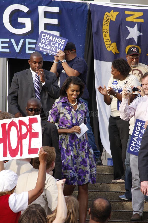 ASHEVILLE, NC - May. 2: Michelle Obama, the wife of presidential candidate Barack Obama speaking at a podium during a campaign rally at the University of North Carolina Asheville on May 2, 2008. ASHEVILLE, NC - May. 2: Michelle Obama, the wife of presidential candidate Barack Obama speaking at a podium during a campaign rally at the University of North Carolina Asheville on May 2, 2008.