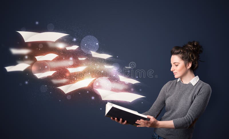 Молодая дама читая книгу при листы летания приходя из b стоковое фото