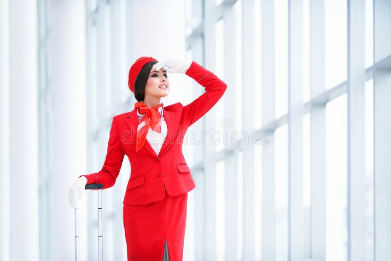 Молодой stewardess стоковые фотографии rf Молодой stewardess стоковые фотографии rf