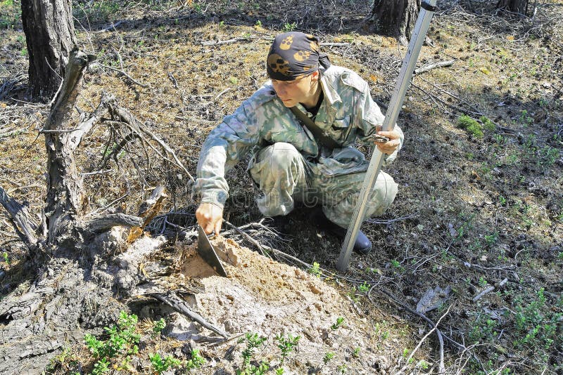 A young archaeologist in search of finds in the field expedition in Siberia. A young archaeologist in search of finds in the field expedition in Siberia