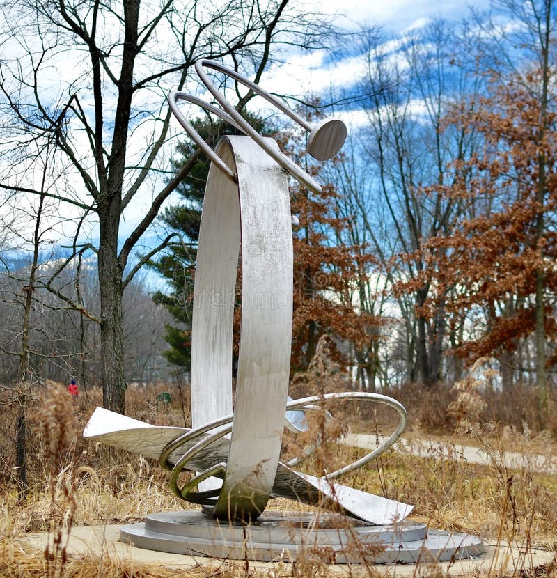 This is a Winter picture of a piece of public art titled: Molecular Reflections, on exhibit at Wendell Sculpture Garden at Meadowbrook Park located in Urbana, Illinois in Champaign County. This stainless steel sculpture was created by Christiane T. Martens in 1997. This picture was taken on January 4, 2019. This is a Winter picture of a piece of public art titled: Molecular Reflections, on exhibit at Wendell Sculpture Garden at Meadowbrook Park located in Urbana, Illinois in Champaign County. This stainless steel sculpture was created by Christiane T. Martens in 1997. This picture was taken on January 4, 2019.