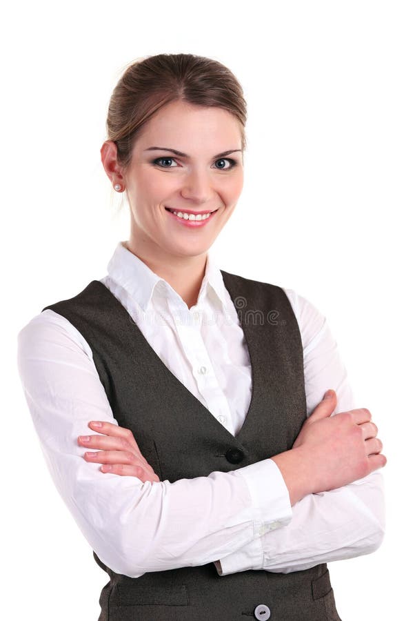 Young business woman smiling brightly and standing with her hands folded. Young business woman smiling brightly and standing with her hands folded