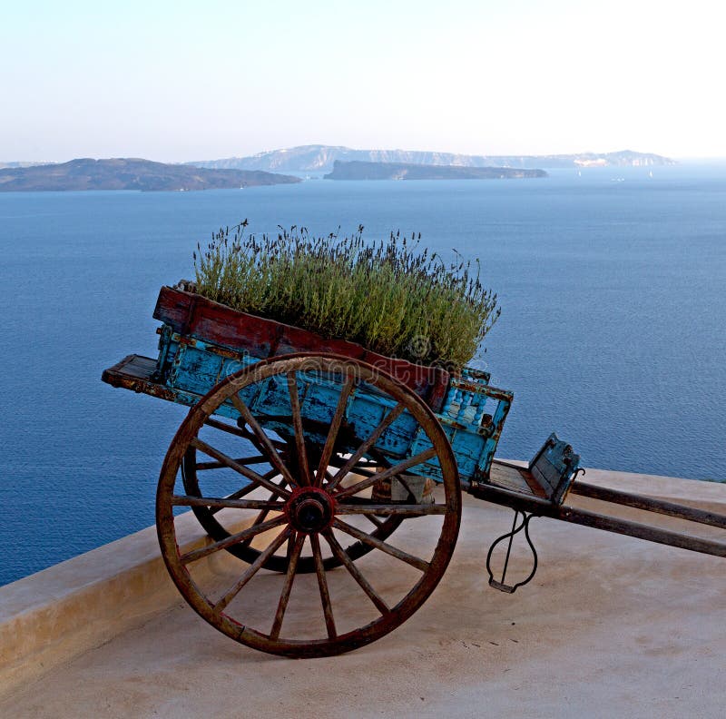 море ручной тележки в santorini Европы Кикладов архитектуры старом стоковое фото море ручной тележки в santorini Европы Кикладов архитектуры старом стоковое фото