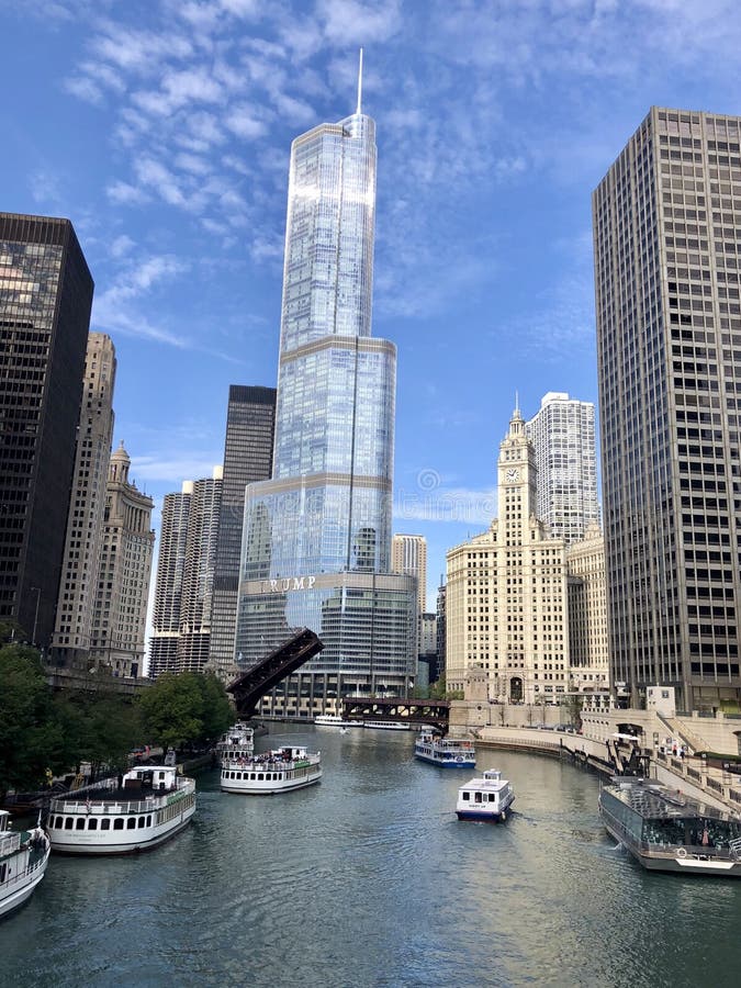 This is a Fall picture looking West up the Chicago River located in Chicago, Illinois in Cook County. This picture features the DuSable Bridge in the up position and iconic Chicago skyscrapers in the background. This picture was taken on October 3, 2018. This is a Fall picture looking West up the Chicago River located in Chicago, Illinois in Cook County. This picture features the DuSable Bridge in the up position and iconic Chicago skyscrapers in the background. This picture was taken on October 3, 2018.