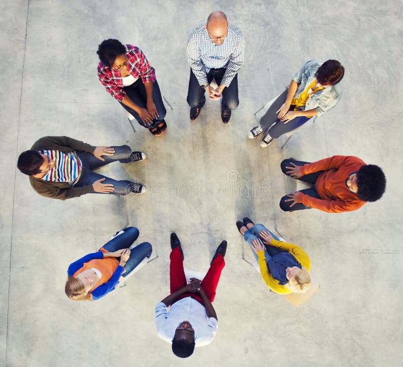 Multi-Ethnic Group of People Sitting in Circle. Multi-Ethnic Group of People Sitting in Circle.