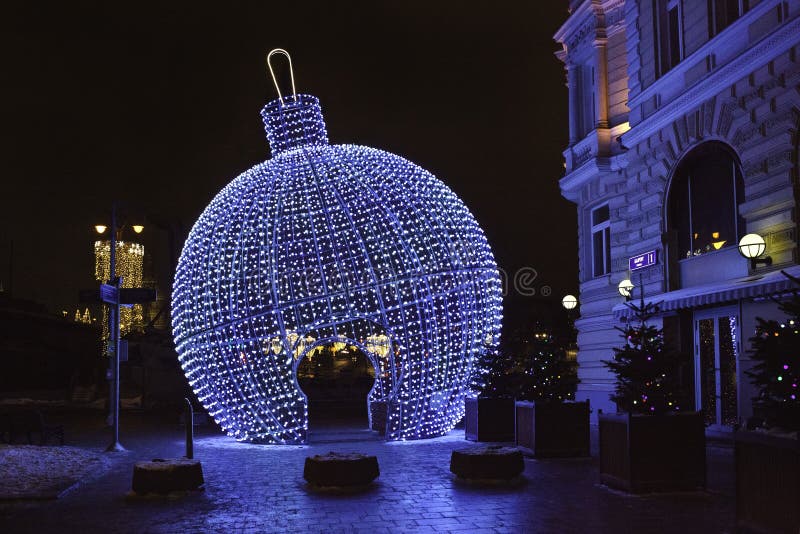 New Year Ball is lightened on the street. New Year decoration in Moscow. New Year Ball is lightened on the street. New Year decoration in Moscow.