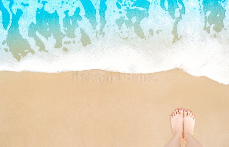 Feet on beach background. Top view on naked feet and legs in sand with wave motion coming to the foot - foaming sea texture. Summer and vacation holiday concept. Selfie barefoot woman standing ocean. Feet on beach background. Top view on naked feet and legs in sand with wave motion coming to the foot - foaming sea texture. Summer and vacation holiday concept. Selfie barefoot woman standing ocean