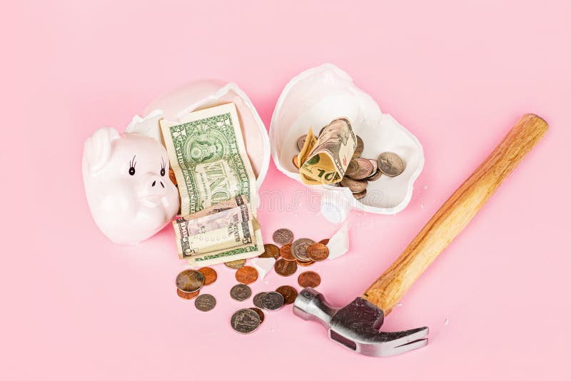 Broken Piggy bank on pink background. mockup, template. Concept of financial crisis after coronavirus covid-19 pandemic. Broken Piggy bank on pink background. mockup, template. Concept of financial crisis after coronavirus covid-19 pandemic.