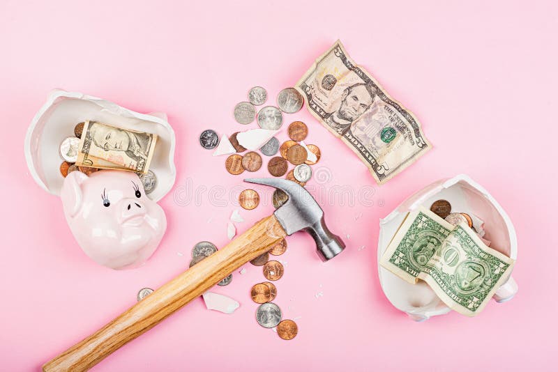 Broken Piggy bank on pink background. mockup, template. Concept of financial crisis after coronavirus covid-19 pandemic. Broken Piggy bank on pink background. mockup, template. Concept of financial crisis after coronavirus covid-19 pandemic.