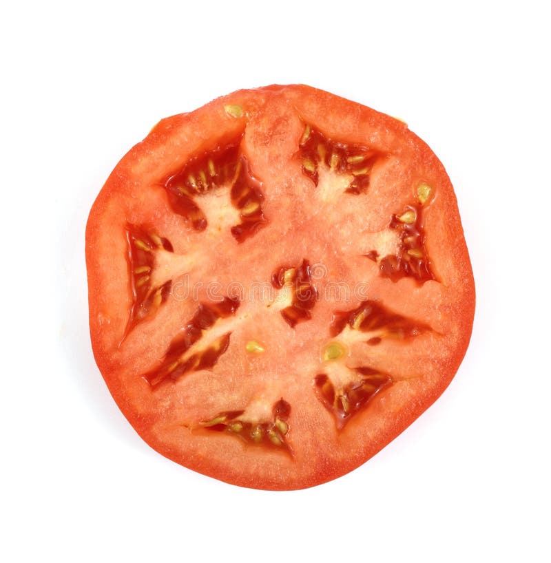 Overhead view of a slice of a hot house beefsteak tomato. Overhead view of a slice of a hot house beefsteak tomato.