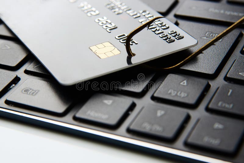 Нападение кредитной карточки phishing Кредитная карточка рыболовный крючок, конец-вверх стоковое изображение rf Нападение кредитной карточки phishing Кредитная карточка рыболовный крючок, конец-вверх стоковое изображение rf