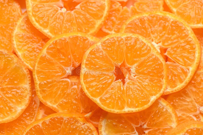 sliced juicy appetizing tangerines as a food background 2. sliced juicy appetizing tangerines as a food background 2