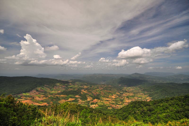 Phu Ruea National Park is located 60 kilometres (37 mi) west of Loei town in Phu Ruea district. The park's area is 121 square kilometres (47 sq mi).[1] Phu Ruea mountain is 1,365 metres (4,478 ft) tall and experiences some of Thailand's coldest temperatures. In December and January temperatures here can fall below freezing. Phu Ruea means 'boat mountain', a name inspired by the shape of a cliff at the peak.[1] Other peaks within the park include Phusun at 1,035 metres (3,396 ft) and Phuku at 1,000 metres (3,300 ft).[2]. Phu Ruea National Park is located 60 kilometres (37 mi) west of Loei town in Phu Ruea district. The park's area is 121 square kilometres (47 sq mi).[1] Phu Ruea mountain is 1,365 metres (4,478 ft) tall and experiences some of Thailand's coldest temperatures. In December and January temperatures here can fall below freezing. Phu Ruea means 'boat mountain', a name inspired by the shape of a cliff at the peak.[1] Other peaks within the park include Phusun at 1,035 metres (3,396 ft) and Phuku at 1,000 metres (3,300 ft).[2]