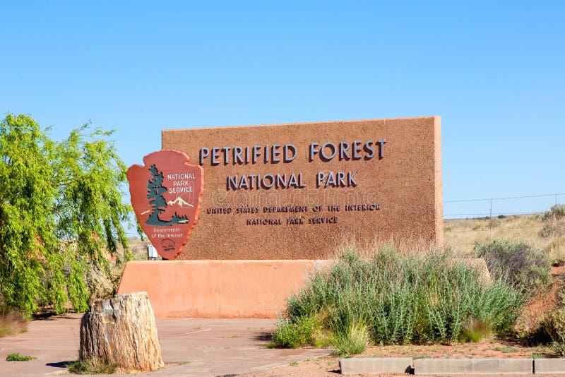 The sign at the entrance to the Petrified Forest National Park. The sign at the entrance to the Petrified Forest National Park